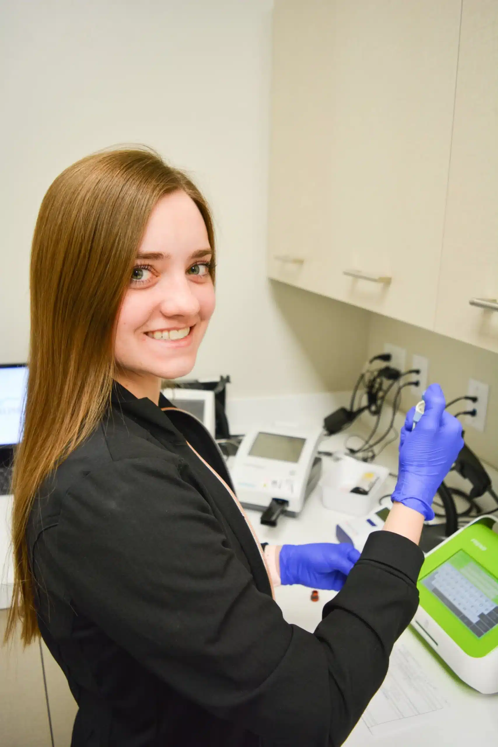 Female Lab Tech testing samples at Ridgeline Medical Idaho Falls, ID